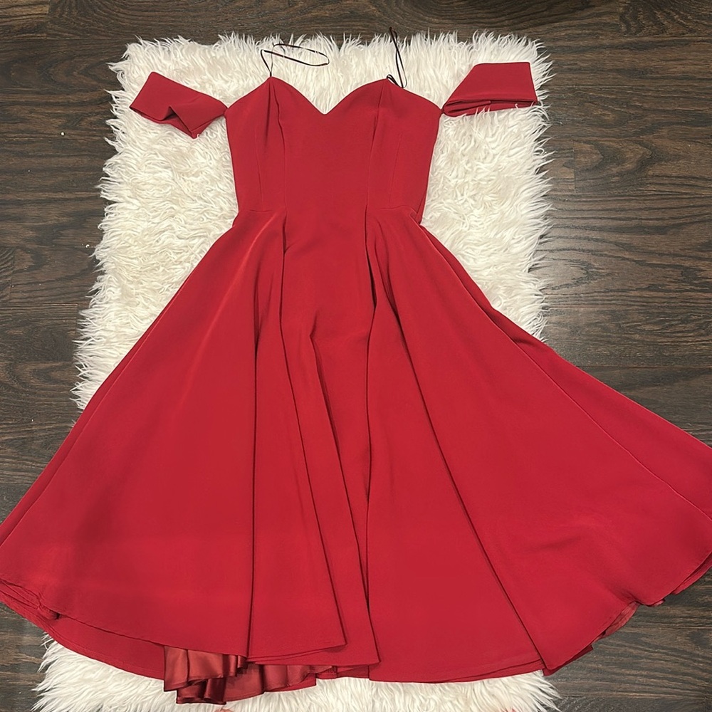 Sara bataglia dress in burgundy color.